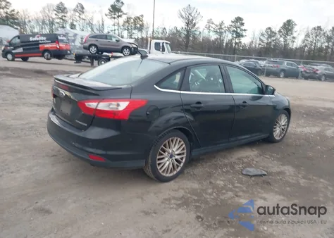 2014 Ford Focus Titanium z USA, uszkodzony, nr VIN 1FADP3J28EL134524